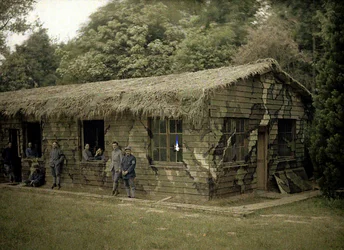 Nine French Soldiers at a Wooden Building with Military Camouflage, Soissons, Aisne, France